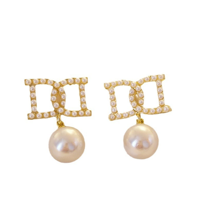 Wholesale Alloy Letter D Pearl Earrings JDC-ES-SM009