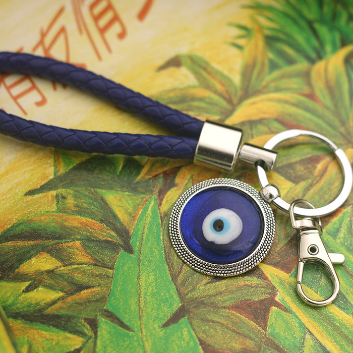 Wholesale Blue eyed blank metal keychain and chain gift keychain, fashionable and versatile