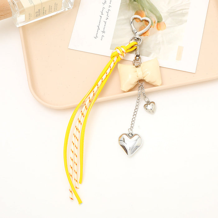 Wholesale Leather bow heart pendant luggage keychain lanyard accessories single buckle tassel pendant accessories