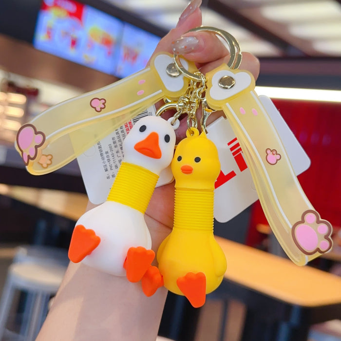 Wholesale Retractable animal pendant PVC doll keychain