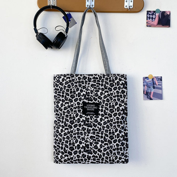 Wholesale Small niche, high-capacity commuting, fashionable design, leopard print handheld