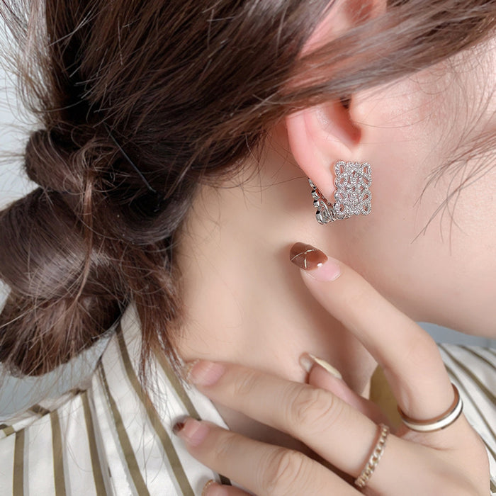 Wholesale 18K gold-plated copper square stud earrings with zircon openwork design