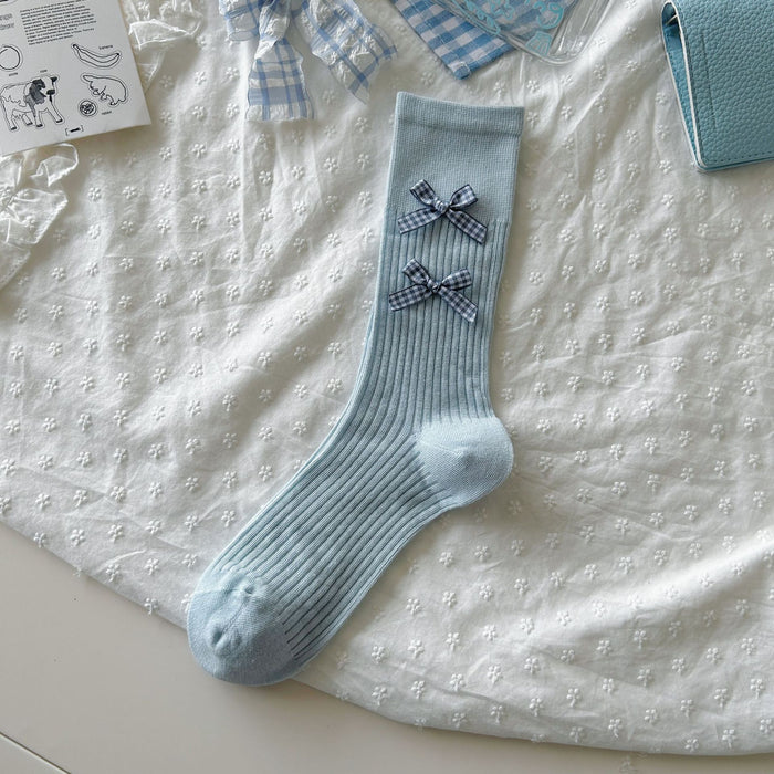 Wholesale Bow tie socks, long tube pile socks