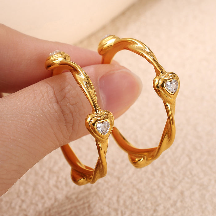 Wholesale Light luxury high-end photosensitive surface handmade heart-shaped earrings, fashionable and versatile temperament heart-shaped stainless steel earrings