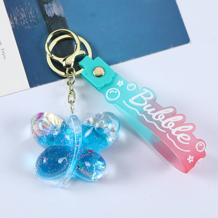 Wholesale Acrylic oil butterfly quicksand keychain bag pendant candy color