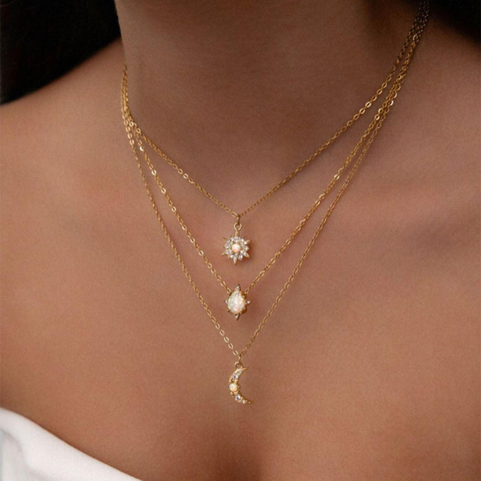 Wholesale Popular retro multi-layer layered star moon necklace with light luxury design and diamond studded water droplet pendant