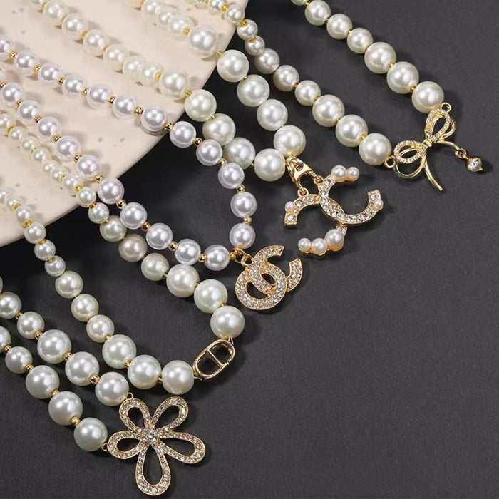 Wholesale  Double C Pearl Bow Female Shell Pearl Necklace-JDC-NE-Dingy007