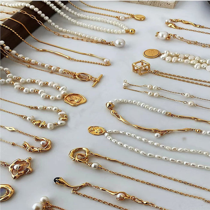 Wholesale Pearl necklace for women, light luxury, niche design, high-end feeling, collarbone chain, retro necklace, sweater chain, accessory