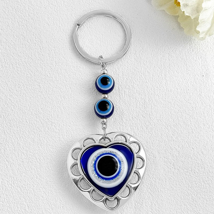 Wholesale Diamond-encrusted blue eyes evil eye tassel keychain