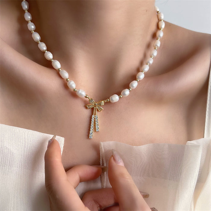 Wholesale New bow pearl pendant necklace with a light luxury and niche design, featuring a collarbone chain and elegant neck chain