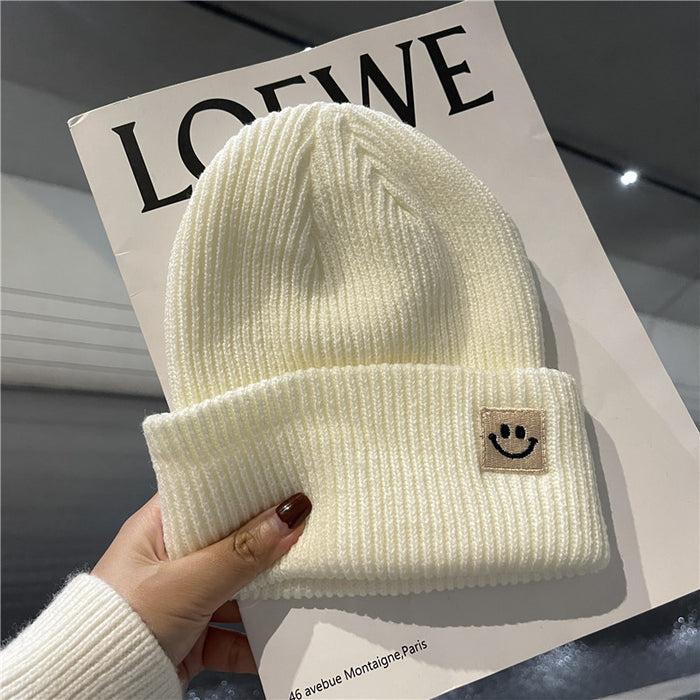 Wholesale Autumn and Winter Cute Smiley Face Logo Wool Knitted Hat JDC-FH-Yizhan002