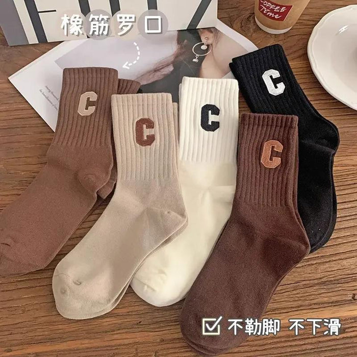 Wholesale Letter socks versatile mid tube socks soft and breathable for sports