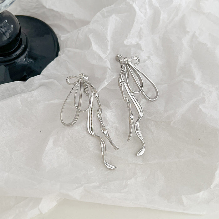 Wholesale Butterfly knot ear clip without ear hole, niche exaggerated earrings and earrings