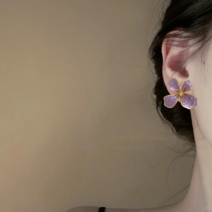 Wholesale A niche retro oil dripping purple four leaf flower earring design with a unique, simple, versatile temperament and fashionable style