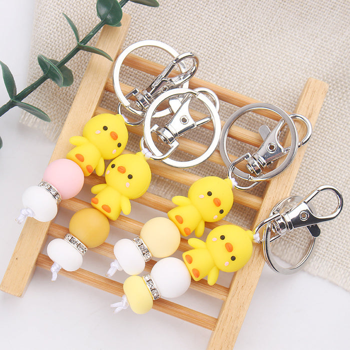 Wholesale Santa Cartoon Little Yellow Duck Silicone Beaded Keychain JDC-KC-GuangTian032