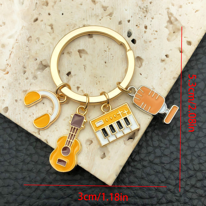 Wholesale oil dripping music guitar keyboard headset microphone star keychain key ring