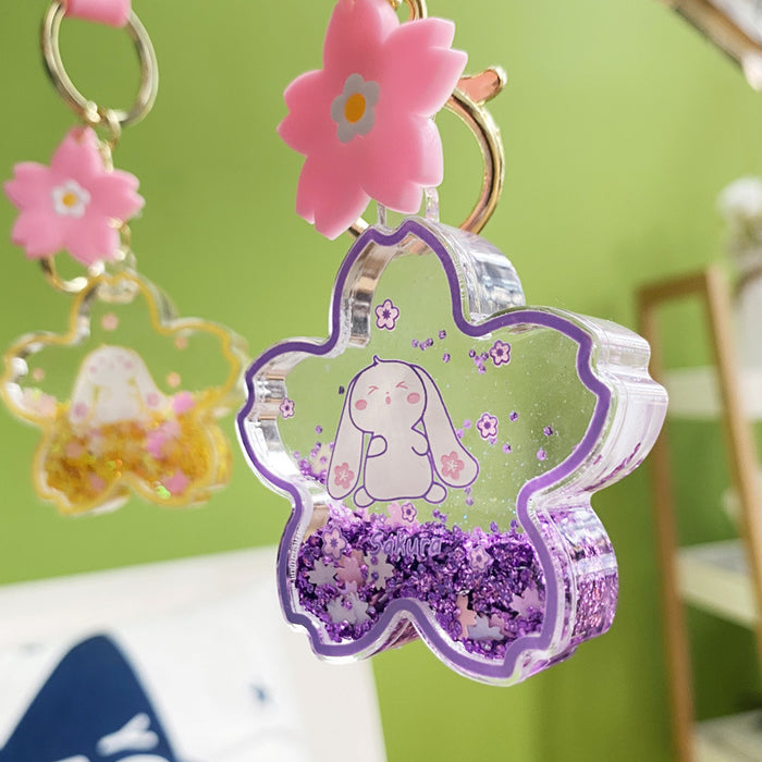 Wholesale sequins into oil snowflake keychain creative liquid chain girls exquisite pendant