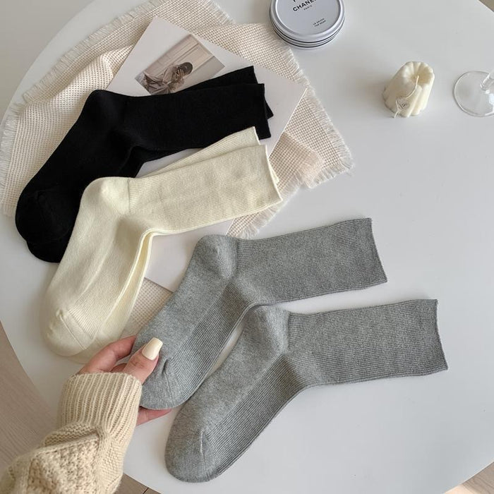 Wholesale Versatile thin strip pile socks, basic solid color mid tube socks