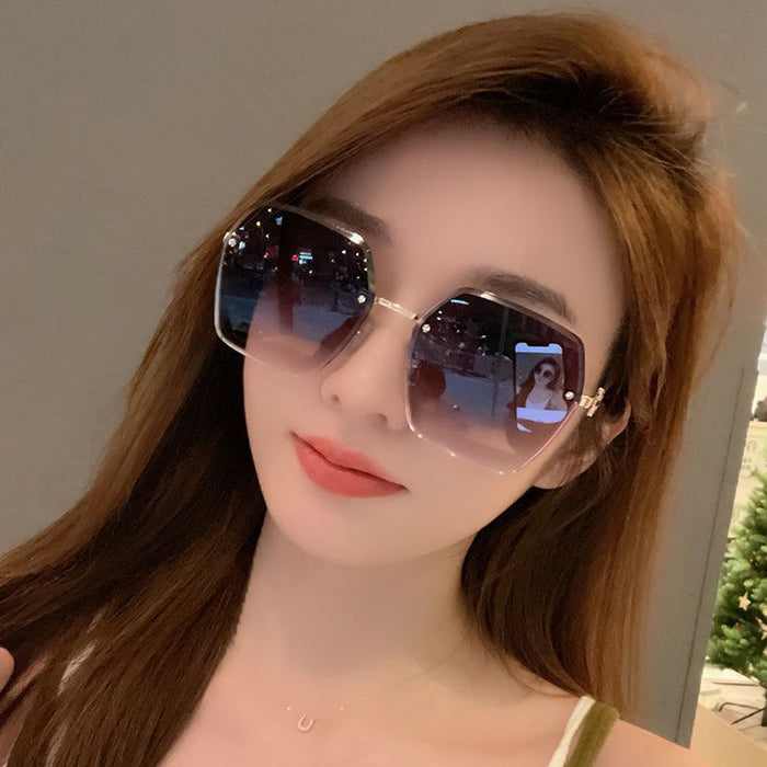 Wholesale Sunscreen slimming frameless couple sunglasses