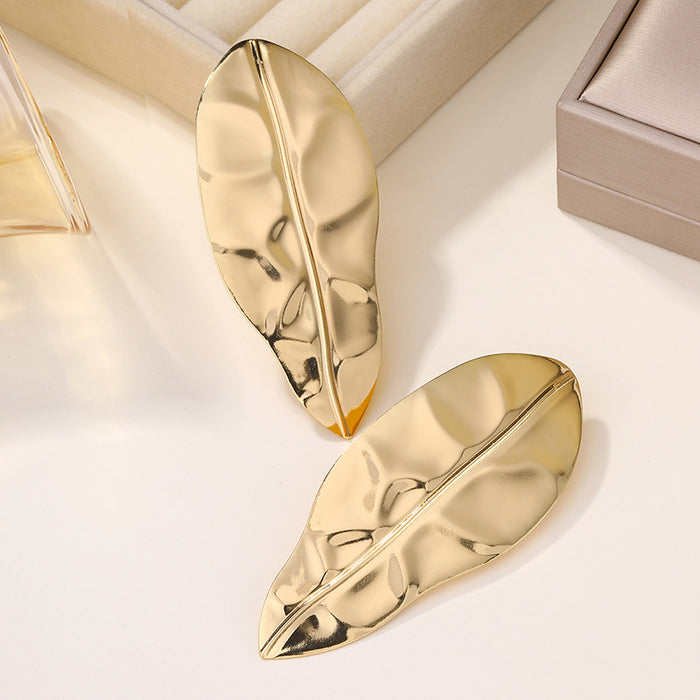 Wholesale Exaggerated alloy leaf earrings, niche folds, irregular earrings, earrings, studs