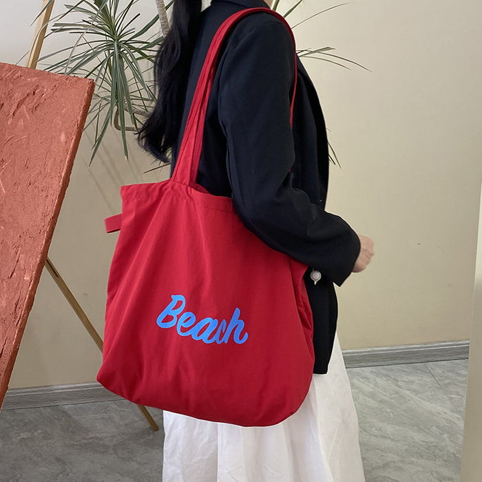 Wholesale Artistic lazy canvas bag, casual versatile shoulder bag, large capacity tote bag