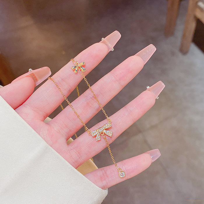 Wholesale Diamond studded bow zircon necklace, fashionable and niche design, collarbone chain pendant, necklace accessory