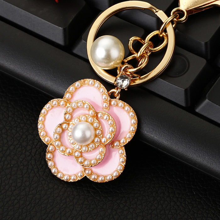 Wholesale Camellia car keychain pendant, metal keychain ring, diamond inlaid pearl rose pendant