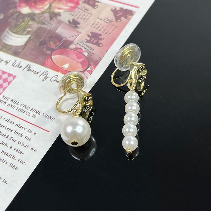Wholesale Exaggerated asymmetrical pearl ear clip design, minimalist temperament earrings