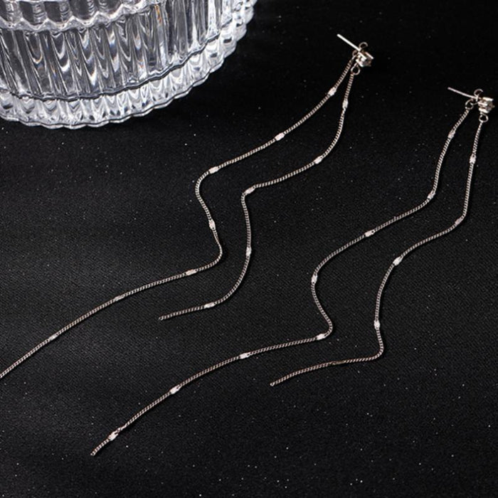 Wholesale Pure silver long tassel earrings, niche, high-end, temperament, ear string, earring chain