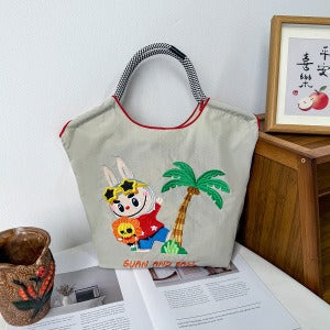 Wholesale Embroidered canvas crossbody bag zipper shoulder bag women' s fashionable handbag