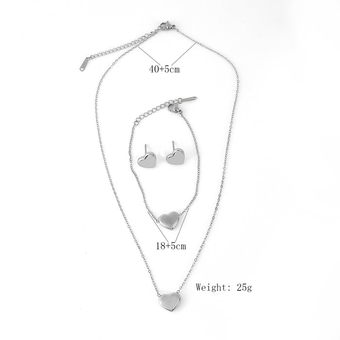 Wholesale Fashion classic stainless steel heart necklace bracelet earrings three piece set wholesale solid pendant