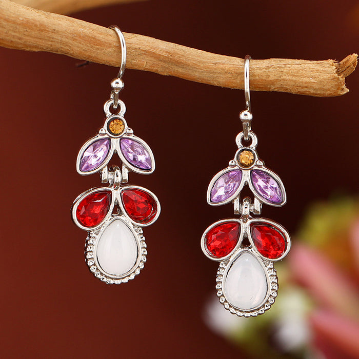 Wholesale Inlaid with colorful leaves,  crystal diamonds and moonstone earrings,  European and American creative water drop pear-shaped earrings for women