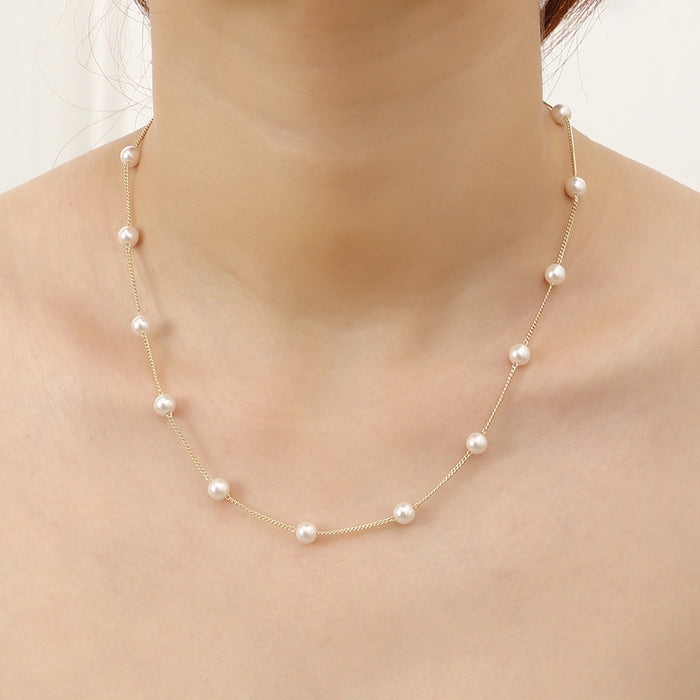 Wholesale Elegant and atmospheric pearl necklace, niche design, versatile, copper plated real gold neck chain, locking bone chain