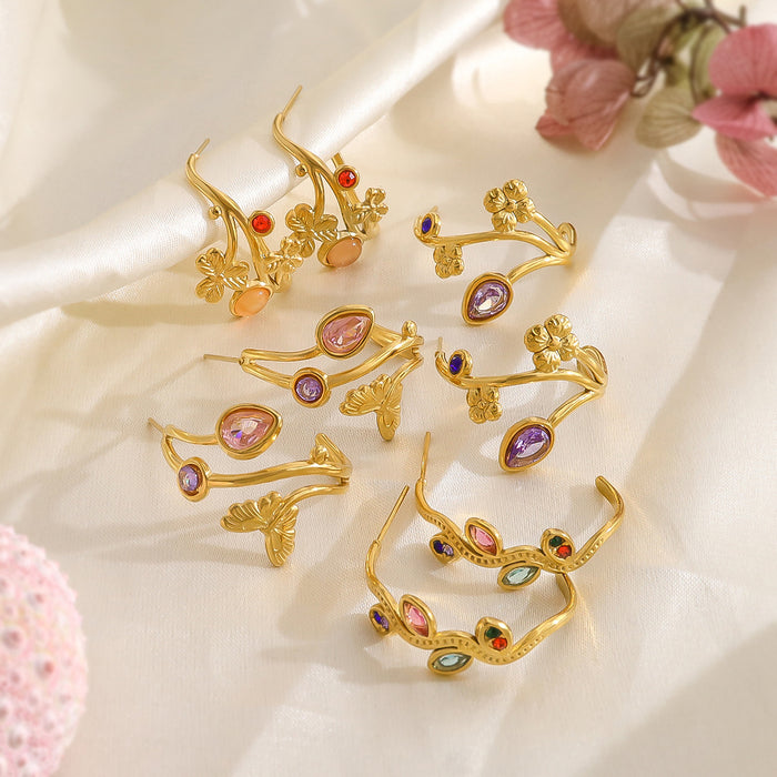 Wholesale Gold titanium steel earrings inlaid with colorful horse eye zircon stainless steel earrings, female hollow leaf C-shaped earrings