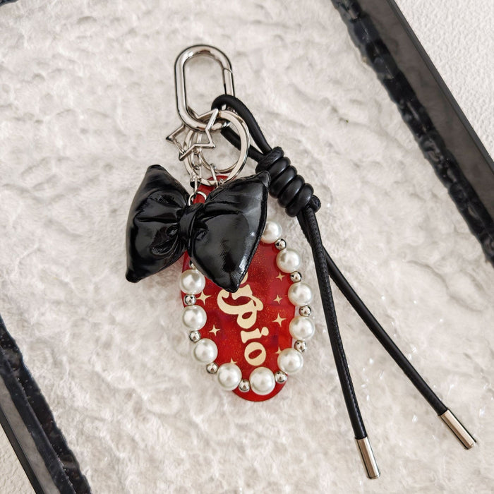 Wholesale Simple Bow Woven Leather Rope Pearl Chain Hanging Keychain