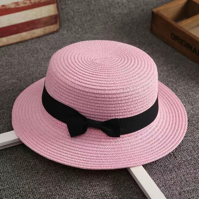 Wholesale New wide eave flat top straw hat for sun protection, vacation bow top hat for versatile sun protection