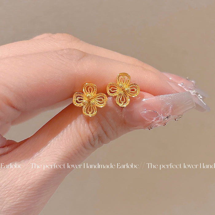Wholesale Sand gold hollowed out exquisite flower earrings, niche temperament earrings, high-end and versatile earrings
