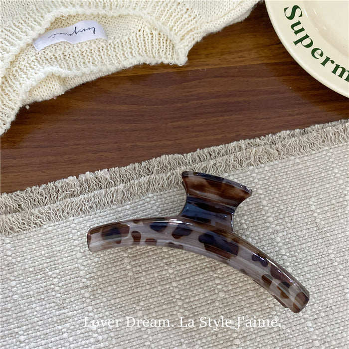 Wholesale Leopard print cross bow geometric hair clip, fashionable grip clip, versatile hair accessory