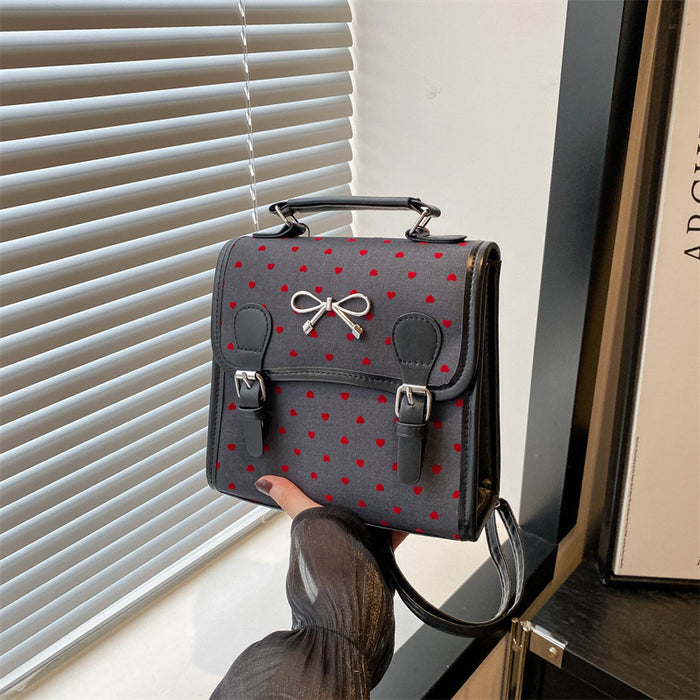 Wholesale Casual and fashionable handbag with heart-shaped printed canvas shoulders