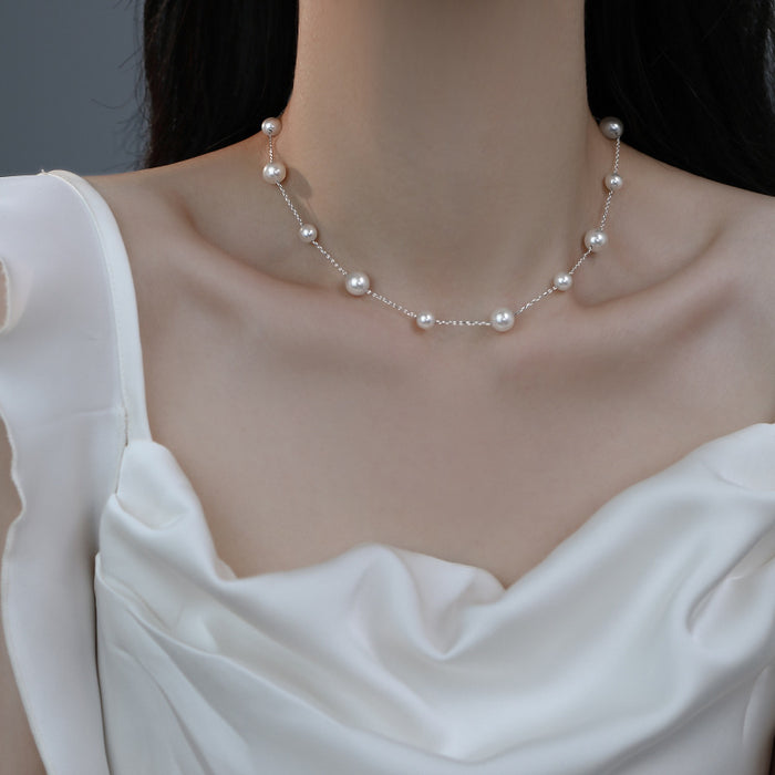 Wholesale Titanium steel pearl necklace sweater chain long bead light luxury niche tassel collarbone chain neck chain