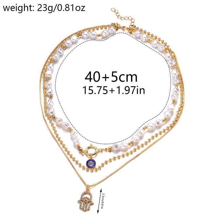 Wholesale New exaggerated jewelry alloy diamond inlaid multi-layer necklace for women, pearl eyes, palm pendant