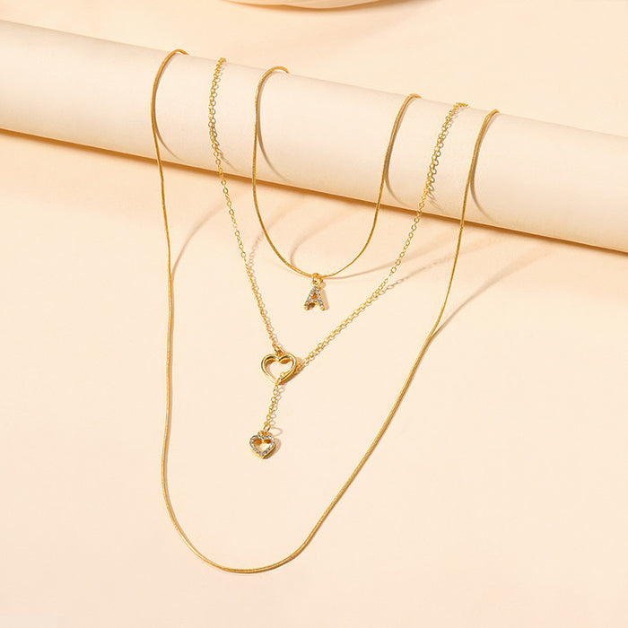Wholesale Versatile jewelry, letter necklace, alloy heart tassel, three-layer necklace