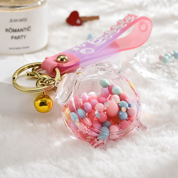 Wholesale Acrylic oil bottle candy Bean astronaut keychain