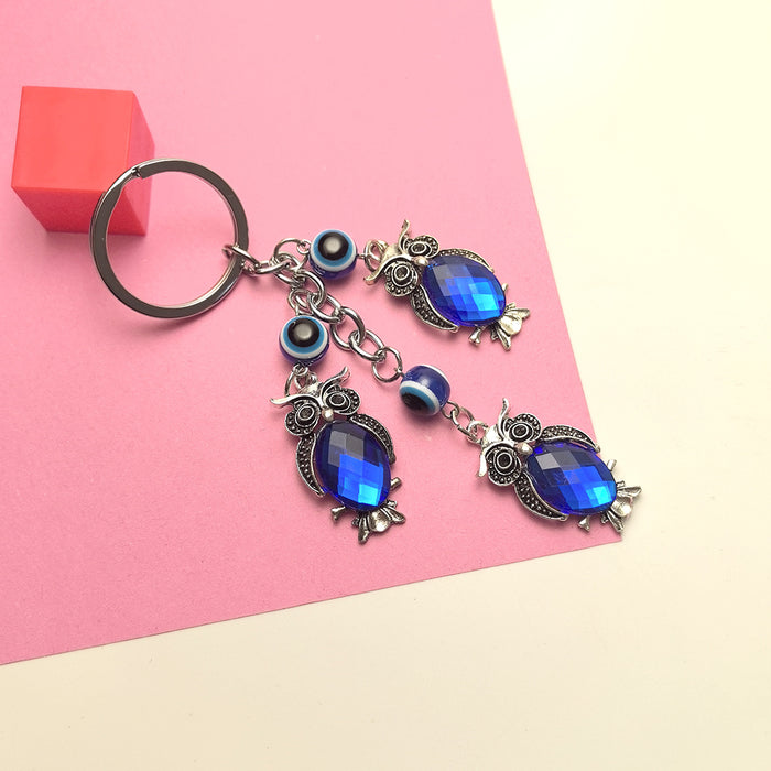 Wholesale Blue Eye Pendant Flower Butterfly Keychain Pendant Bag