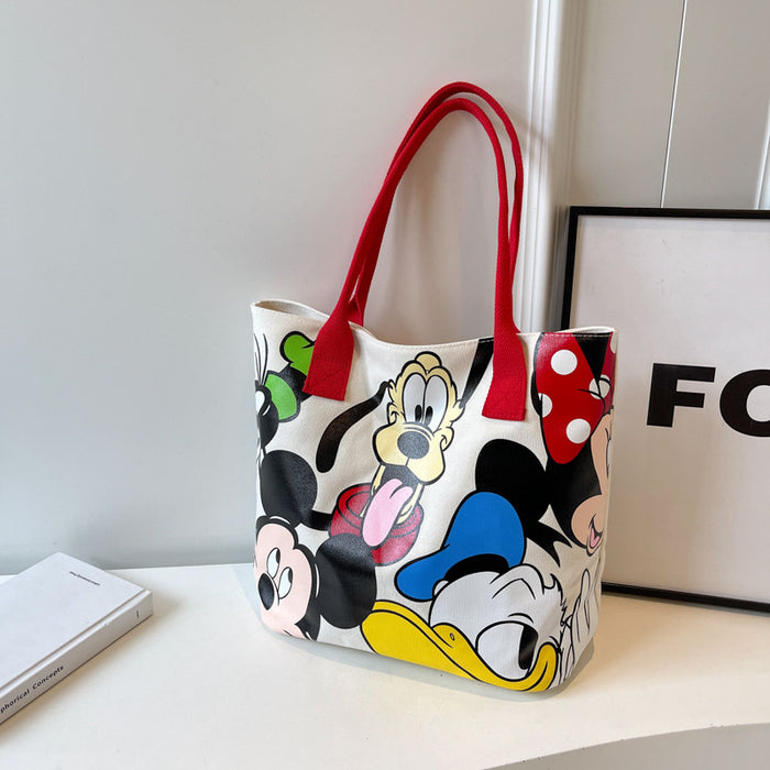 Wholesale Cartoon large capacity canvas shoulder bag, women's casual versatile tote bag, student class backpack, handbag