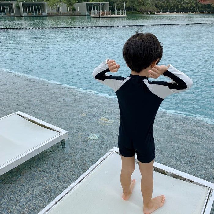 Wholesale Children's long sleeved sun protection quick drying one-piece hot spring swimsuit swimming