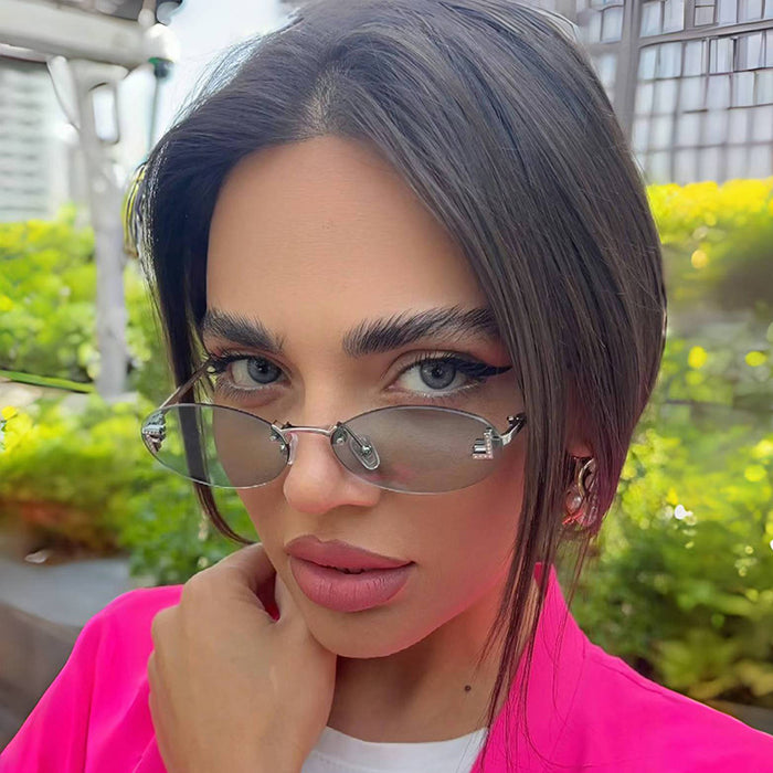 Wholesale Elliptical frame small frame sunglasses, new frameless cut edge personalized glasses, dot diamond sunglasses