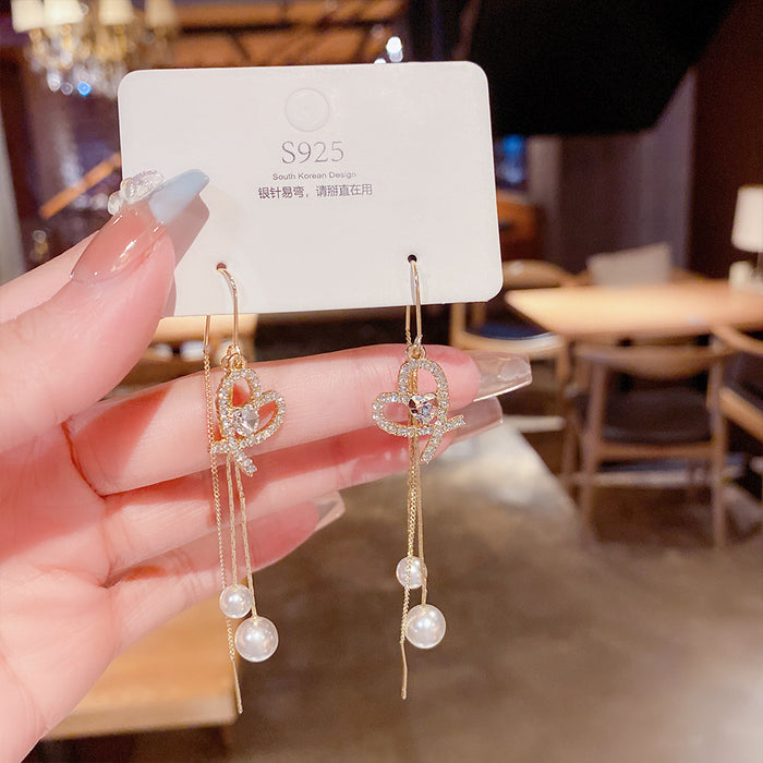 Wholesale Elegant and sparkling diamond studded heart-shaped tassel pearl ear line design, personalized and fashionable temperament, trendy ear accessories