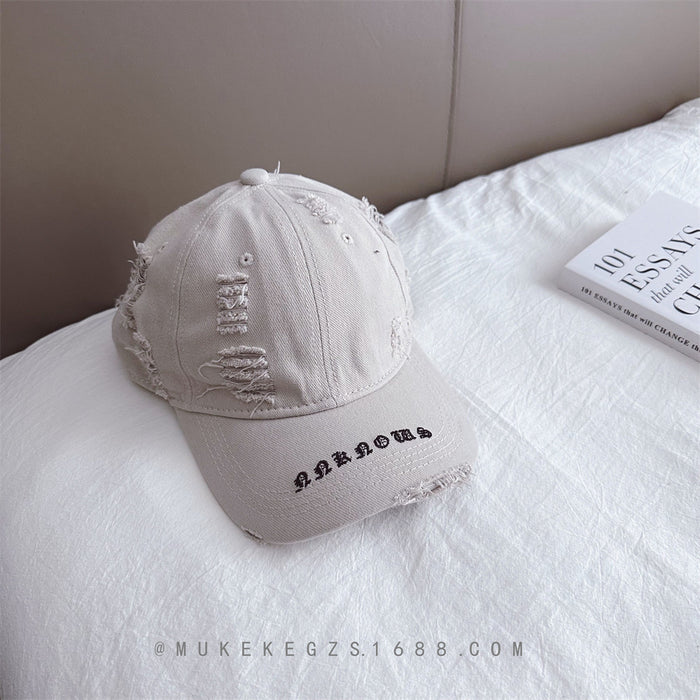 Wholesale Children's duckbill cap with worn holes, embroidered letters, fashionable sun shading baseball caps for boys and girls
