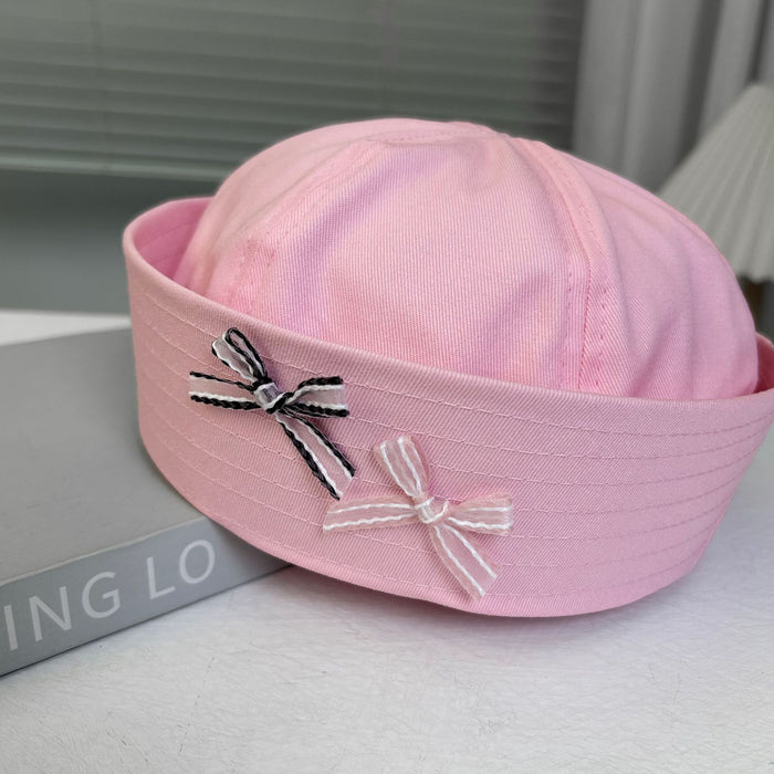 Wholesale Striped bow sailor hat is lightweight, breathable, niche, and comfortable with flip over eaves